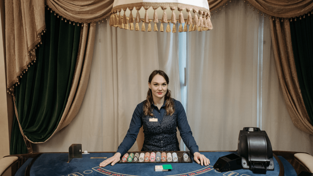 a person standing in front of a casino table