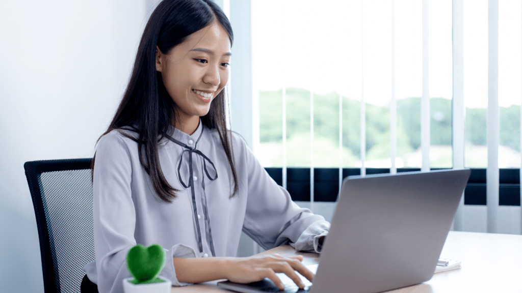 A person working on laptop in office