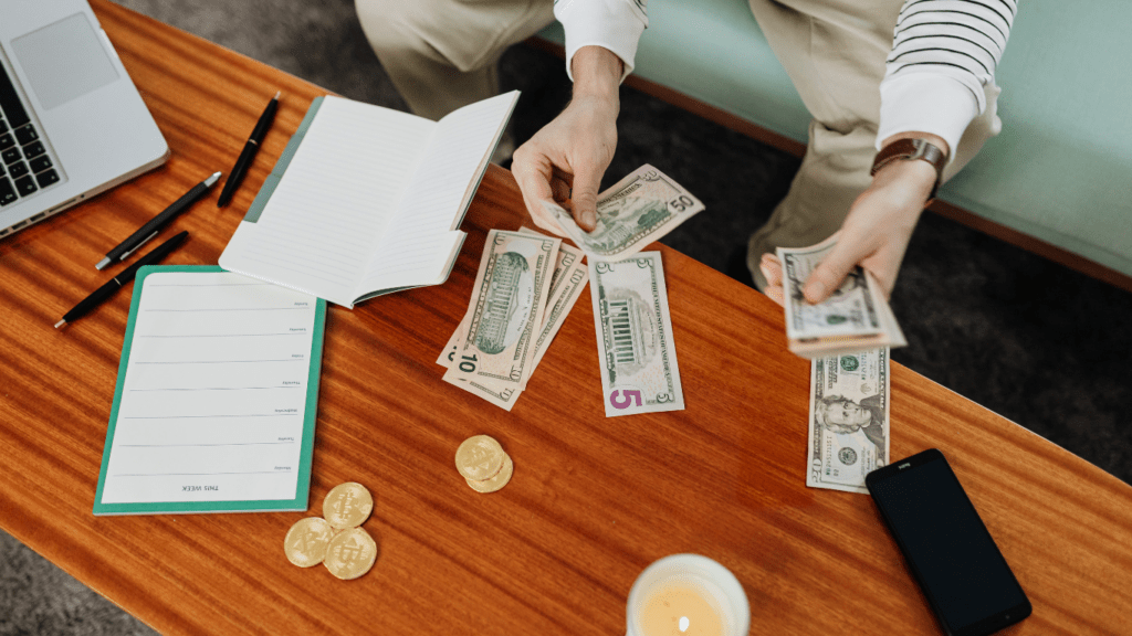 a person counting a money