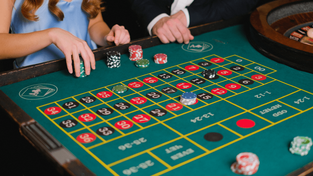 a person playing roulette on a casino table