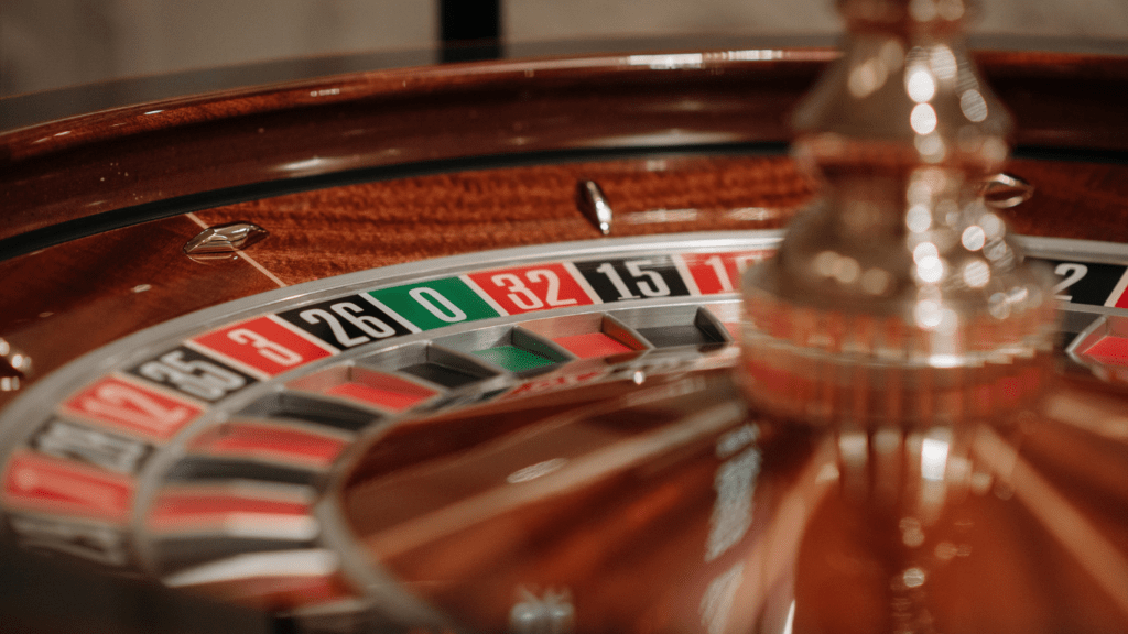 an image of a roulette wheel on a casino table